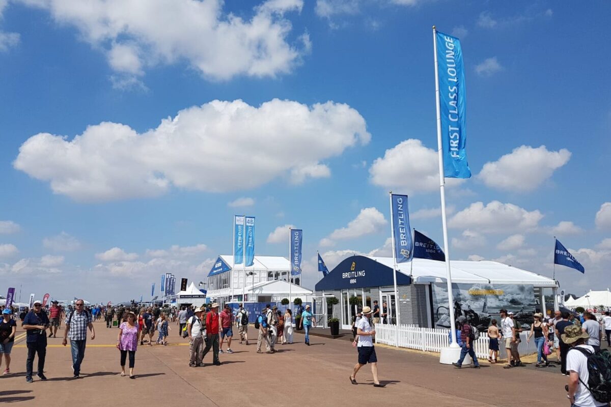 Flags on concrete bases at airshow