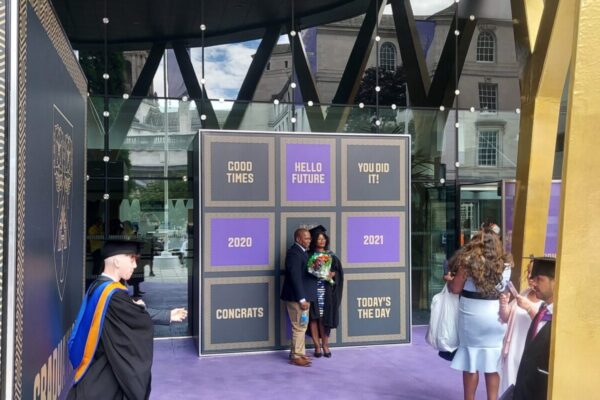 Small super-graphic photo backdrop at Leeds Beckett's graduation ceremony